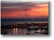 Foto Genova - Panorami - Genova:  porto e lanterna al tramonto